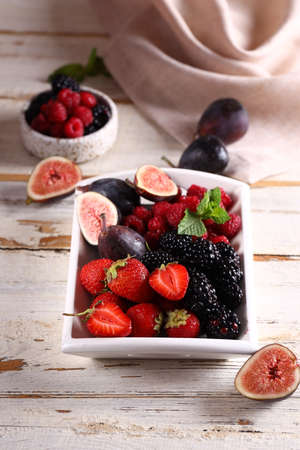 organic ripe assortment of berries and fruits, autumn harvestの写真素材