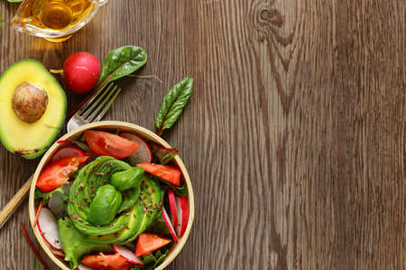 fresh salad with tomatoes and radish, healthy foodの写真素材