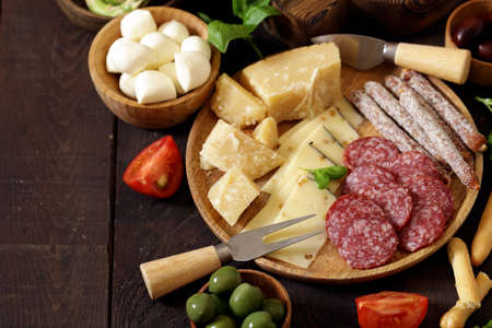 assorted ham, salmon and salami sausage - antipasti appetizerの写真素材