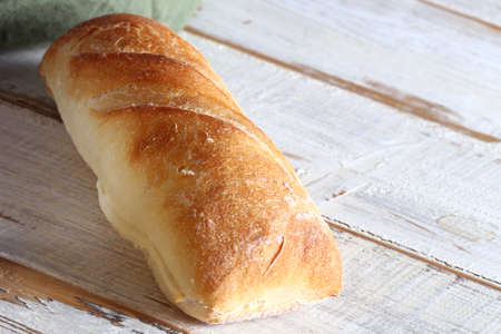 bread loaf of ciabatta on a wooden table