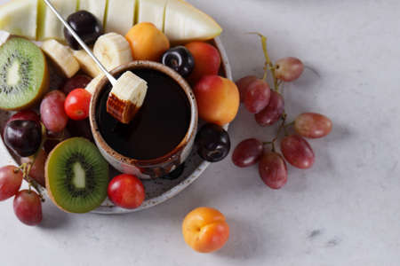 chocolate fondue with berries and fruits