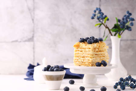 homemade layer cake with fresh berries