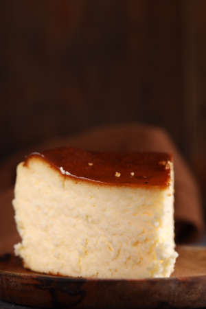 spanish cheesecake cake on a plate dessertの写真素材