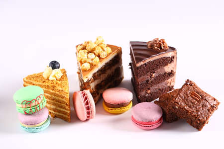 assortment of cakes desserts on white backgroundの写真素材