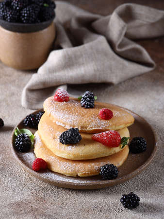 homemade fresh pancakes with fresh berries