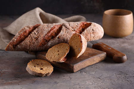 rye flour baguette bread on the table