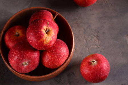 ripe red apples healthy food on the tableの写真素材