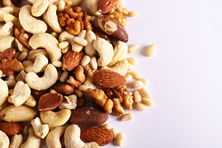 natural assorted nuts on white backgroundの写真素材