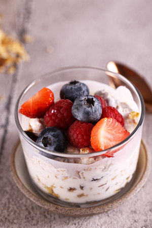 healthy food dessert granola with fresh berriesの写真素材