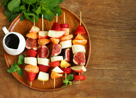 fruit salad with fresh berries and fruitsの写真素材