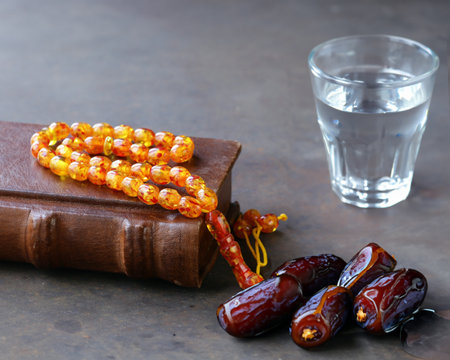 dates and glass of water traditional ramadanの写真素材