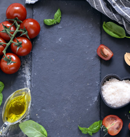 food background with basil and tomatoesの写真素材