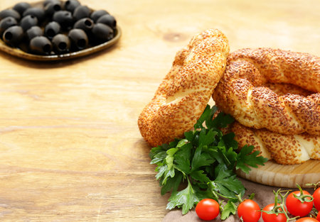 Turkish bagel simit with sesame seeds on the tableの写真素材