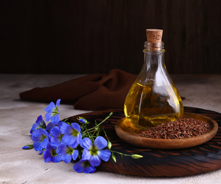 organic vegetable flaxseed oil in bottleの写真素材