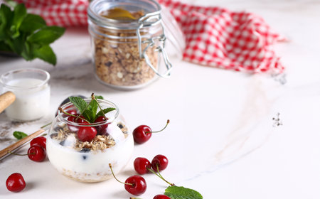 breakfast granola muesli with yogurt and fresh berriesの写真素材