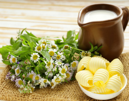 organic butter dairy product on wooden tableの写真素材