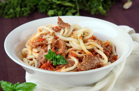traditional dish lagman noodles with vegetables and meatの写真素材