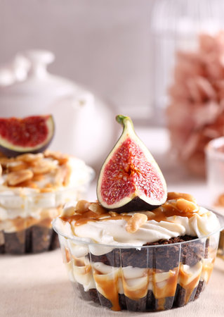 dessert trifle with caramel syrup and figsの写真素材