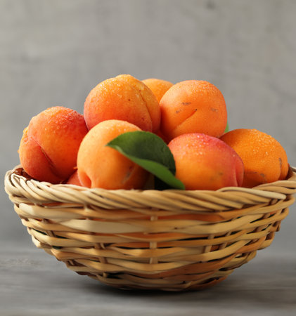 organic ripe apricots peaches on the tableの写真素材