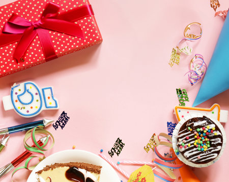 festive background for birthday candles and giftsの写真素材