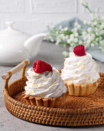 mini cake basket with meringue creamの写真素材
