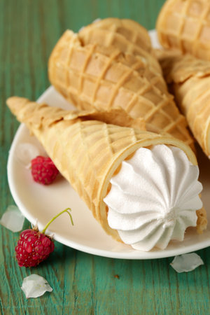 vanilla ice cream in a waffle coneの写真素材