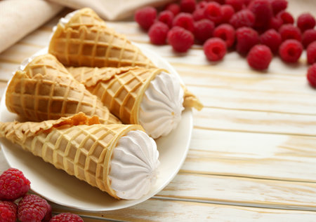 vanilla ice cream in a waffle coneの写真素材
