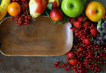 berries and fruits on wooden food backgroundの写真素材