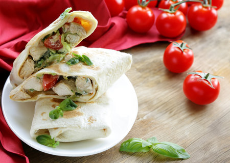 traditional doner kebab with chicken on a plateの写真素材
