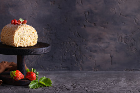 sponge roll dessert with fresh berries