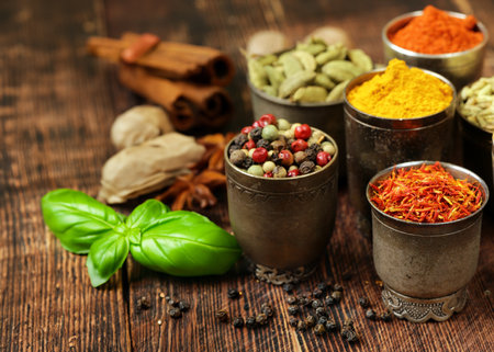 various types of spices on wooden backgroundの写真素材