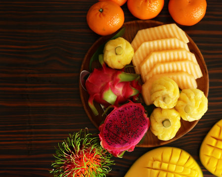 mix tropical fruits, pineapple, banana, dragon fruitの写真素材