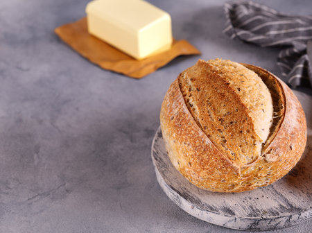 homemade tartine bread with milk and butterの写真素材