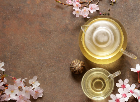 tea ceremony green tea with sakura branchesの写真素材