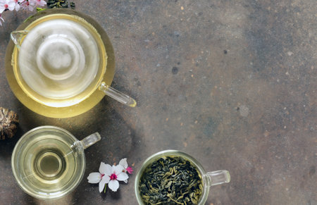 tea ceremony green tea with sakura branchesの写真素材