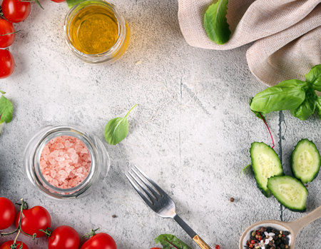 food background with cherry tomatoes basil and spicesの写真素材
