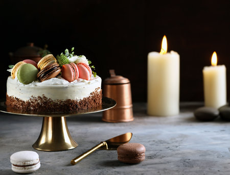 birthday cake with fresh berries and macaronsの写真素材