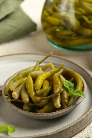 spicy pickled green jalapeno peppersの写真素材