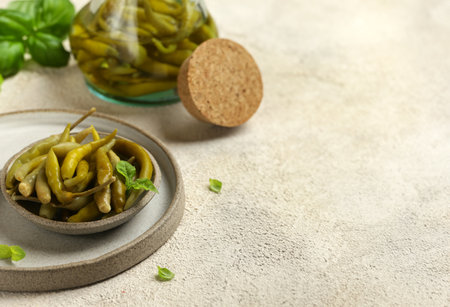 spicy pickled green jalapeno peppersの写真素材