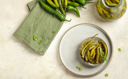 spicy pickled green jalapeno peppersの写真素材