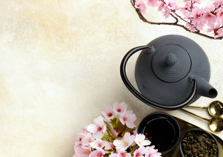 tea ceremony green tea with sakura branchesの写真素材