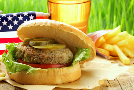 Independence day picnic hot dogs and hamburgersの写真素材