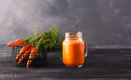 organic fresh carrots for juice and healthy eatingの写真素材