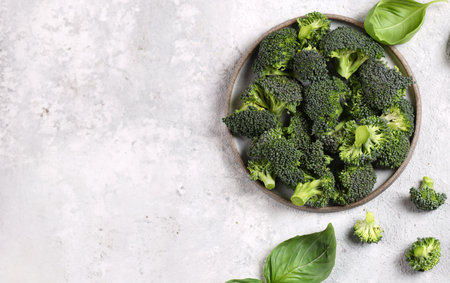 fresh organic broccoli in a bowl for healthy eatingの写真素材