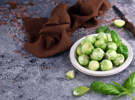fresh Brussels sprouts in a bowl for healthy eatingの写真素材