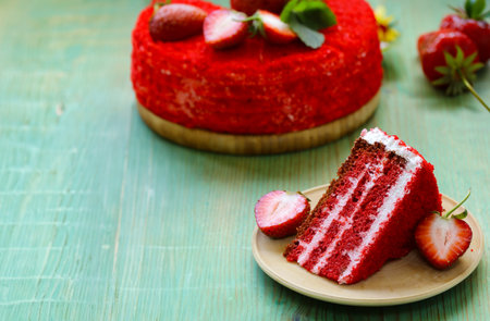 red velvet cake with cream and strawberryの写真素材