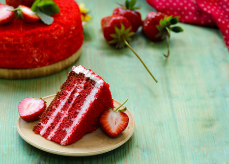 red velvet cake with cream and strawberryの写真素材
