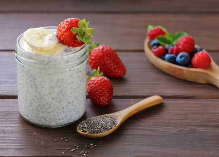 chia pudding in a jar with fresh berriesの写真素材