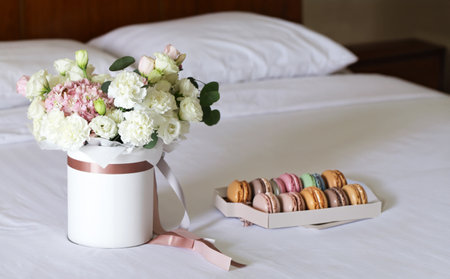 delightful bouquet of white and pink colors in a gift boxの写真素材