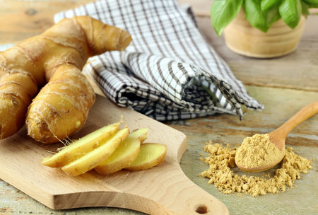 ground and fresh ginger spices for healthy eatingの写真素材
